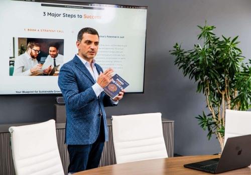 Dr. Charbel Harb guiding clinic owners