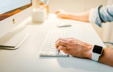 person using iMac