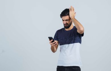 young-handsome-man-using-phone (1)